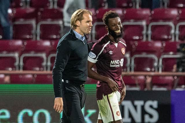 Beni Baningime smiles alongside Hearts manager Robbie Neilson after a man of the match debut in the 2-1 win over Celtic on July 31 (Photo by Ross Parker / SNS Group)