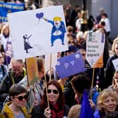 Demonstrators hold placards as they take part in a march by the People's Vote organisation in central London on October 19, 2019, calling for a final say in a second referendum on Brexit. - Thousands of people march to parliament calling for a "People's Vote", with an option to reverse Brexit as MPs hold a debate on Prime Minister Boris Johnson's Brexit deal. (Photo by Niklas HALLE'N / AFP) (Photo by NIKLAS HALLE'N/AFP via Getty Images)