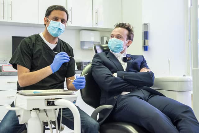 The Scotsman's Westminster correspondent Alexander Brown has his teeth checked by Scottish Labour Leader Anas Sarwar. Picture: Lisa Ferguson