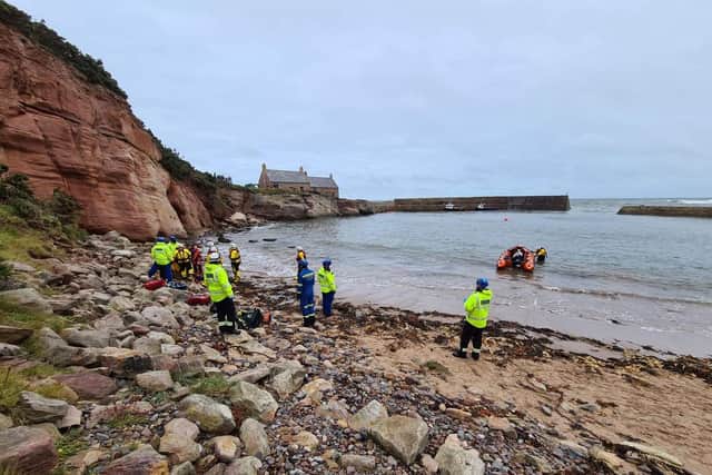 Lifeboat and coastguard teams gave the man some pain relief and oxygen at the scene. Pic: Dunbar RNLI