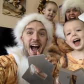 LadBaby, real name Mark Hoyle, celebrating with his wife Roxanne Hoyle and their children, after his song Don't Stop Me Eatin' topped the singles charts for Christmas, making it his third Christmas number one in a row.