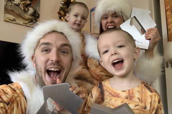LadBaby, real name Mark Hoyle, celebrating with his wife Roxanne Hoyle and their children, after his song Don't Stop Me Eatin' topped the singles charts for Christmas, making it his third Christmas number one in a row.