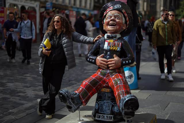 Tourists on Edinburgh' Royal Mile at the Festival Fringe