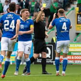 Jamie McCart was booked in the aftermath of conceding a penalty by referee John Beaton.