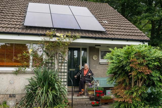 Wheatley Homes tenant Dorothy outside her home in New Abbey.