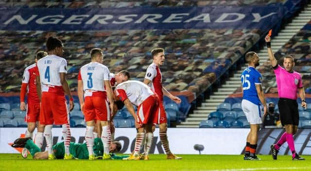 Rangers' Kemar Roofe is sent off by referee Orel Grinfeeld during the UEFA Europa League Round of 16 2nd Leg match between Rangers FC and Slavia Prague at Ibrox Stadium on March 18, 2021, in Glasgow, Scotland.  (Photo by Alan Harvey / SNS Group)