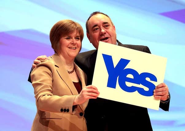 Yes, they were friends - then First Minister Alex Salmond and Deputy Nicola Sturgeon in 2012 (Picture: Ian MacNicol/Getty Images)