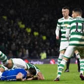 Both Giorgos Giakoumakis and Joe Wright lie in a heap on the group in the controversial incident late in the game when Kilmarnock's penalty appeal was denied by referee Willie Collum. Giakoumakis made it 2-0 to Celtic v Kilmarnock shortly afterwards (Photo by Alan Harvey / SNS Group)