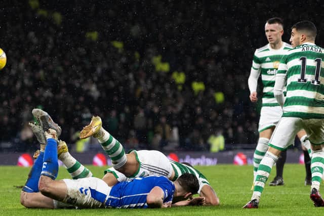 Both Giorgos Giakoumakis and Joe Wright lie in a heap on the group in the controversial incident late in the game when Kilmarnock's penalty appeal was denied by referee Willie Collum. Giakoumakis made it 2-0 to Celtic v Kilmarnock shortly afterwards (Photo by Alan Harvey / SNS Group)