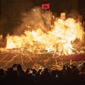 The Jarl Squad set light to the galley in Lerwick on the Shetland Isles during the Up Helly Aa fire festival. Originating in the 1880s, the festival celebrates Shetland's Norse heritage. Jane Barlow/PA Wire