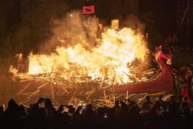 The Jarl Squad set light to the galley in Lerwick on the Shetland Isles during the Up Helly Aa fire festival. Originating in the 1880s, the festival celebrates Shetland's Norse heritage. Jane Barlow/PA Wire