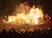 The Jarl Squad set light to the galley in Lerwick on the Shetland Isles during the Up Helly Aa fire festival. Originating in the 1880s, the festival celebrates Shetland's Norse heritage. Jane Barlow/PA Wire