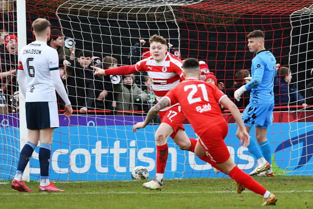 Conor Doan celebrates putting Bonnyrigg Rose ahead against Falkirk. Pic: Michael Gillen