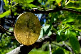 A visual representation of Bitcoin cryptocurrency. Picture: Edward Smith/Getty Images