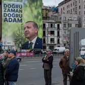 A poster shows the portrait of Turkey's President Recep Tayyip Erdogan ahead of the presidential elections this weekend.