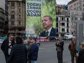 A poster shows the portrait of Turkey's President Recep Tayyip Erdogan ahead of the presidential elections this weekend.