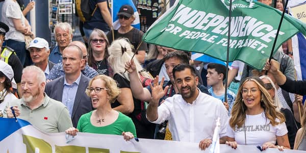 Humza Yousaf and Scottish Green co-leader Lorna Slater march side by side during a Believe in Scotland rally in September (Picture: Jane Barlow/PA)