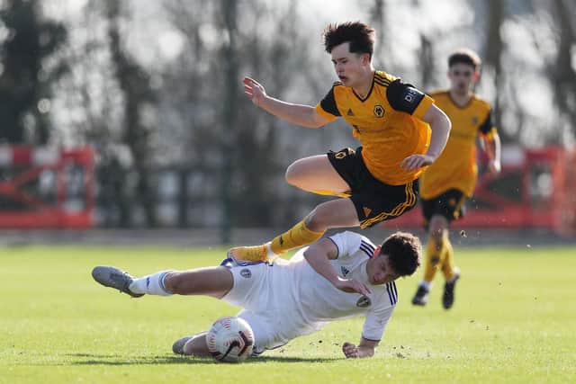 Leeds defender Kris Moore, pictured in action in a youth match against Wolves, has been taken on trial by Hibs.