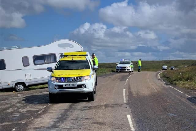 The coastguard operatives helped with traffic management until the police arrived.