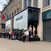 Watch dozens of shoppers queue along Princes Street as Primark reopens