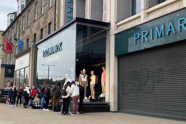 Watch dozens of shoppers queue along Princes Street as Primark reopens