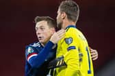Callum McGregor (left) played the two hours at Hampden and has two more Scotland games between now and the Old Firm game next Saturday. (Photo by Craig Williamson / SNS Group)