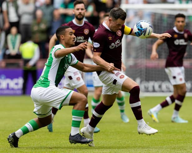 Hearts' Lawrence Shankland and Hibs' Allan Delferriere compete during the Edinburgh derby draw at Tynecastle. (Photo by Mark Scates / SNS Group)