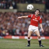 Arthur Albiston in action for Manchester United in 1986.