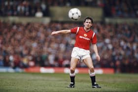Arthur Albiston in action for Manchester United in 1986.