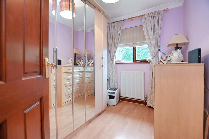 With radiator, laminate floor and double-glazed window to the front.