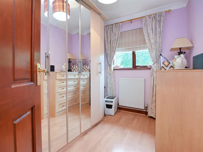 With radiator, laminate floor and double-glazed window to the front.