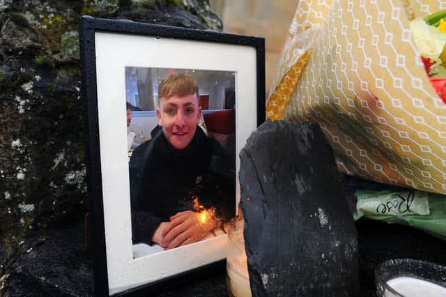 Floral tributes were left at Laurieston Parish Church for Grangemouth teenager Harley Smith.