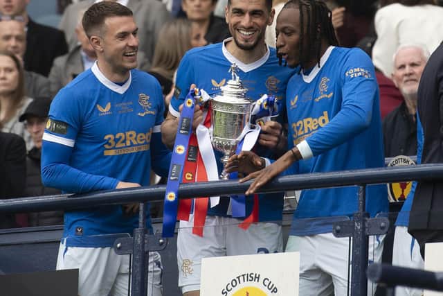 Leon Balogun, centre, helped Rangers win the Scottish Cup.
