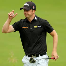 David Law acknowledges the crowds after putting out on the 18th green during the third round of the BMW PGA Championship at Wentworth. Picture: Andrew Redington/Getty Images.