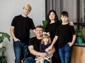 Tatyana Shpygunova with her husband Andriy, sons Oleksii and Ilia and daughter Tatyana.