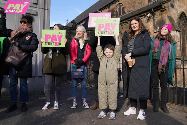 Teachers from the Educational Institute of Scotland (EIS) union take part in a rally outside the Tramway in Glasgow on day two of the strike action in a dispute over pay.  Andrew Milligan/PA Wire