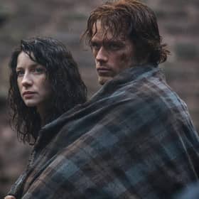 Sam Heughan (right) and Caitriona Balfe star in a scene from Outlander.