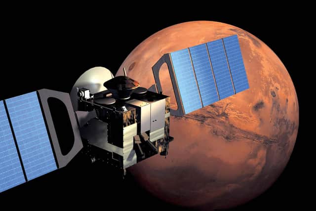 An artist's impression shows the Mars Express satellite in orbit around the Red Planet (Picture: AFP via Getty Images)