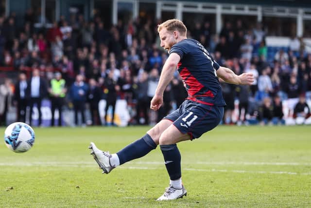 Josh Sims scores the winning penalty for Ross County in the Premiership play-off final. (Photo by Craig Williamson / SNS Group)