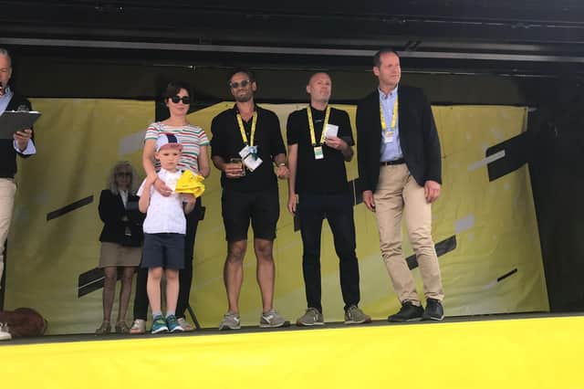 Race director Christian Prudhomme joined on stage by Moore's wife Virginie and five-year-old son Maxime, plus his colleagues Daniel Friebe and Lionel Birnie. Pic: Charlotte Elton