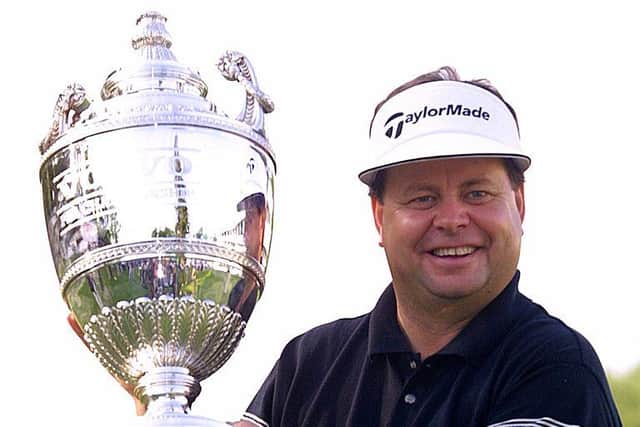 Andrew Oldcorn holds the trophy after winning the 2001 Volvo PGA Championship at Wentworth. Picture: Andrew Redington/ALLSPORT.