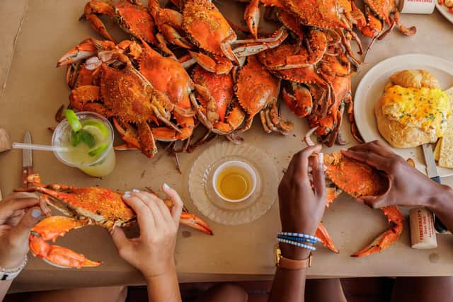Shelling the blue crabs, for which Maryland is famed. Pic: Contributed