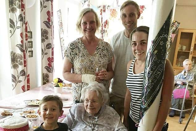 Rita pictured on her 97th birthday with her family. Picture: SWNS