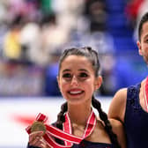 Gold medallists Lilah Fear and Lewis Gibson attend the medal ceremony for the ice dance free dance during ISU Grand Prix of Figure Skating NHK Trophy in Japan. The pair scooped their first gold, pipping European champions Charlene Guignard and Marco Fabbri to the win.