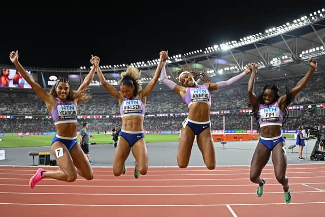 Nicole Yeargin, left, celebrates with Team GB team-mates Laviai Nielsen, Amber Anning and Ama Pipi after winning bronze in the women's 4x400m relay at the World Athletics Championships in Budapest in 2023. (Photo by Hannah Peters/Getty Images)