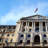 The Bank of England, above, has a target to peg inflation at about 2 per cent.