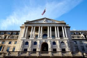 The Bank of England, above, has a target to peg inflation at about 2 per cent.