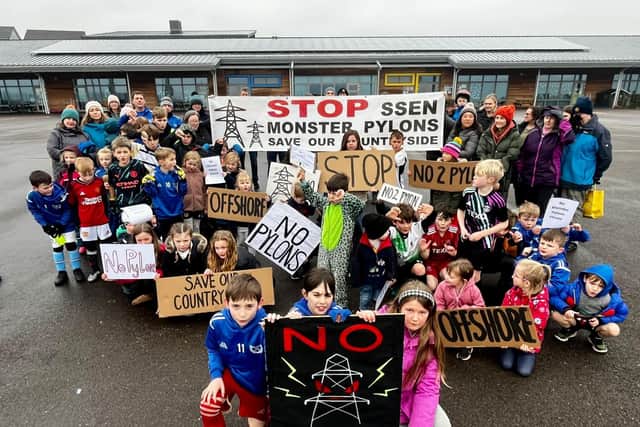 Dozens turned out to protest against SSEN's plans outside Drumoak Primary School (pic: Anne Shearer)