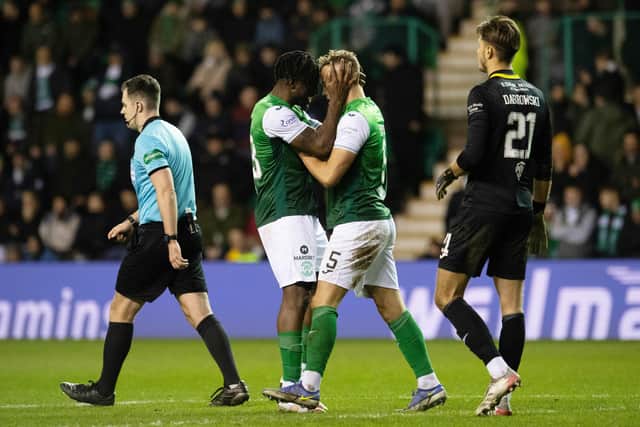Bushiri and Ryan Porteous during Hibs' 0-0 draw with Hearts.