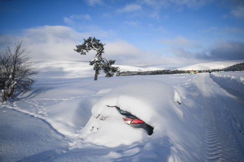 The heavy snowfall has left this car in Cabrach, Scotland, almost entirely covered.